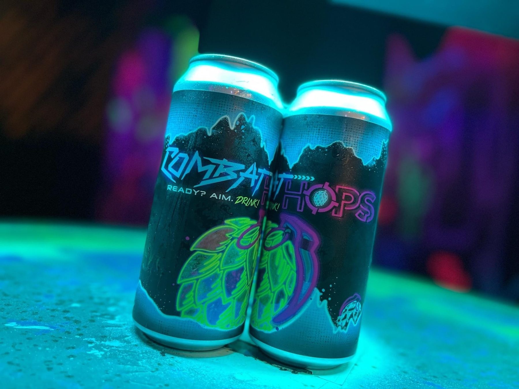 Cans of Combat Hops IPA, brewed for Combat Ops