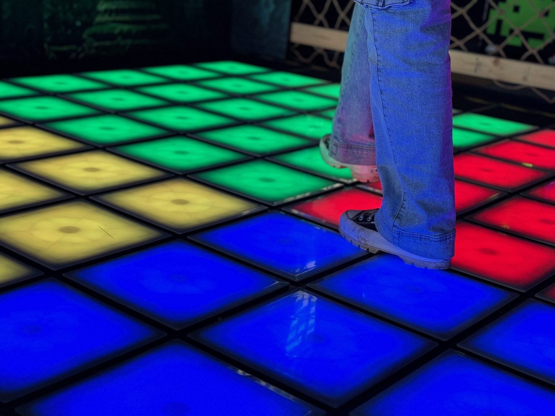 The lit Flash Pads floor game at Combat Ops