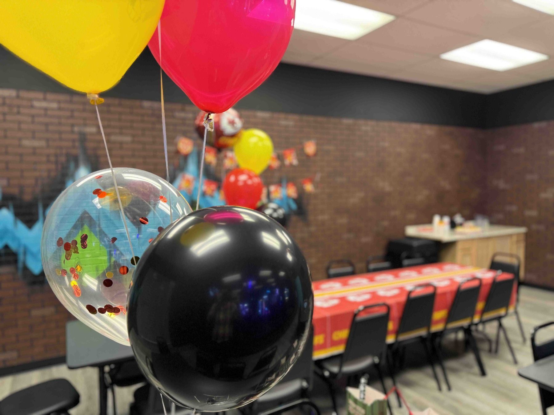 A Combat Ops party room set up with balloons before a birthday